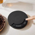 Outin Claro round coffee scale with silicone mat and LED display