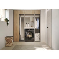 Haier X Series 5 10kg 1400 rpm Washing Machine - Graphite - in a utility room