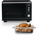 Ninja Crispi Microwave and Air Fryer, Black, MW101BK1 — front view with roast chicken
