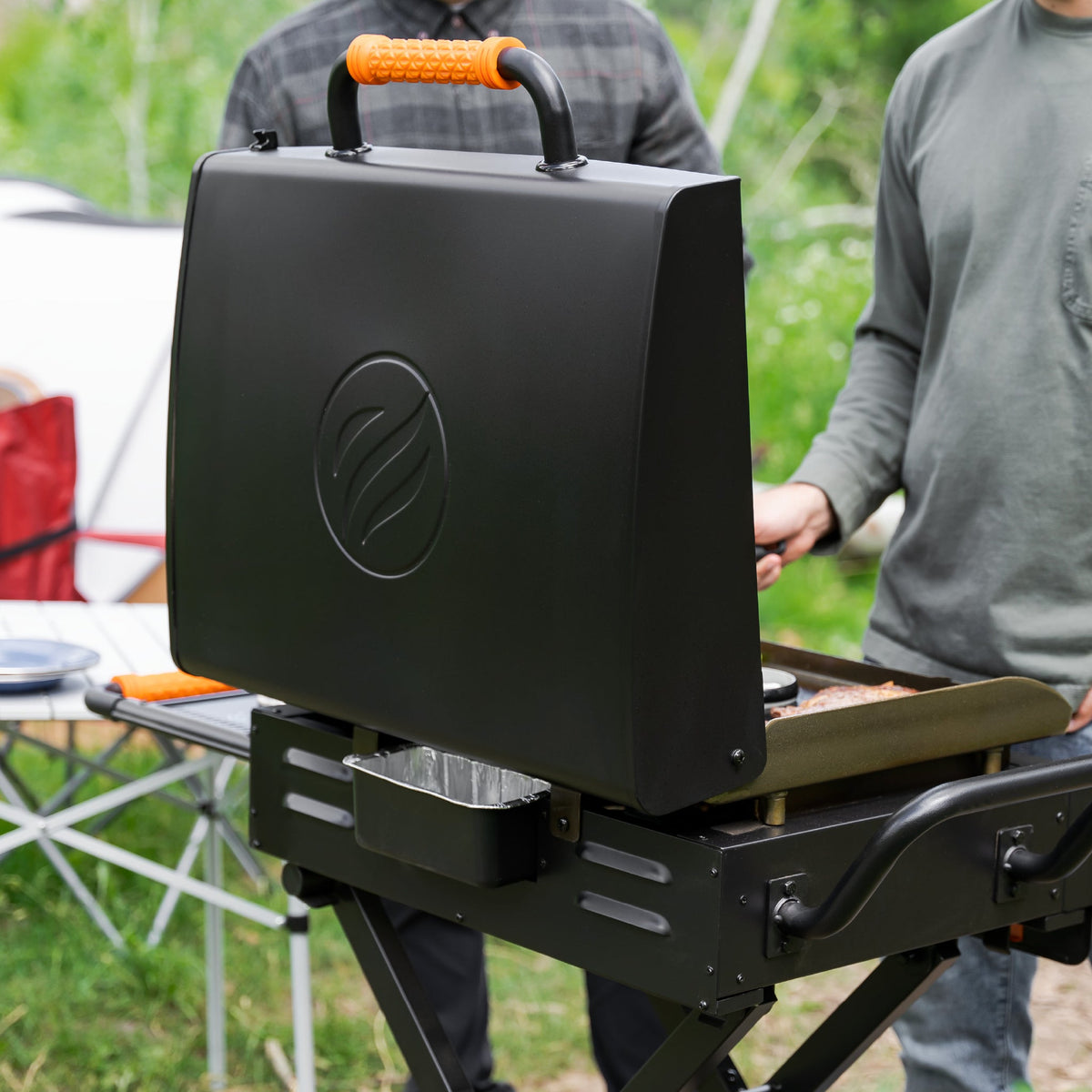 Blackstone On The Go 22" Omnivore Gas Griddle with Hood and Flexfold Legs - Black - hood closed and latched
