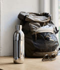 Aarke To-Go Bottle for Carbonator Pro, 500ml — lifestyle shot with backpack
