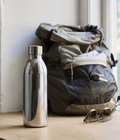 Aarke To-Go Bottle for Carbonator 3, 650ml — lifestyle shot with backpack