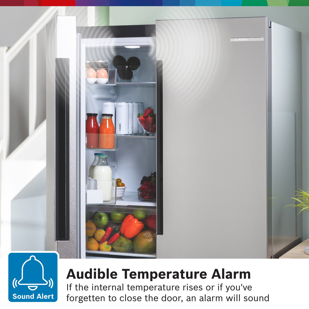 Bosch XXL KFN96VPEAG 4 door fridge freezer with the door open, showing the temperature alarm display