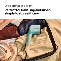 Braun QuickStyle 3 Garment Steamer - Green - packed in a suitcase for travel