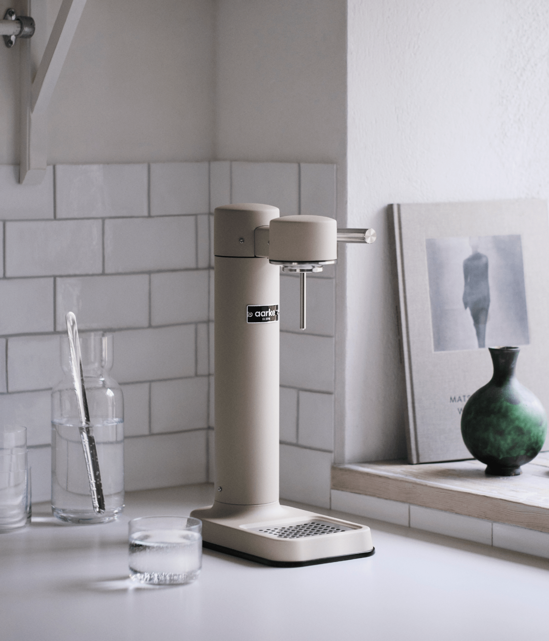 Aarke Carbonator 3 sparkling water maker in Sand — full front studio shot