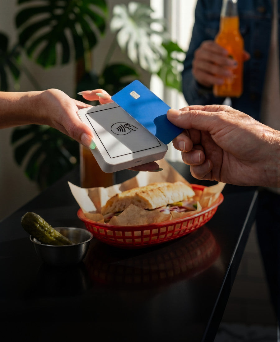 SumUp Solo Card Reader - in use at a table