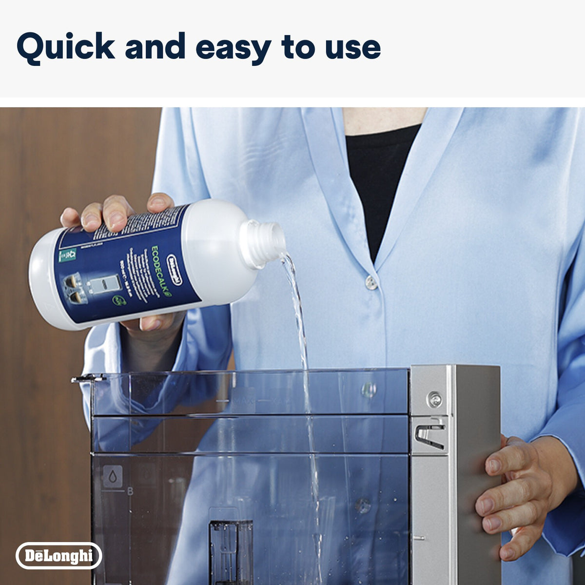De'Longhi EcoDecalk Descaler - White - pouring into the water tank
