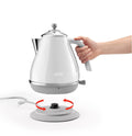 De'Longhi Icona Capitals Kettle - White - lifting off the 360-degree swivel base