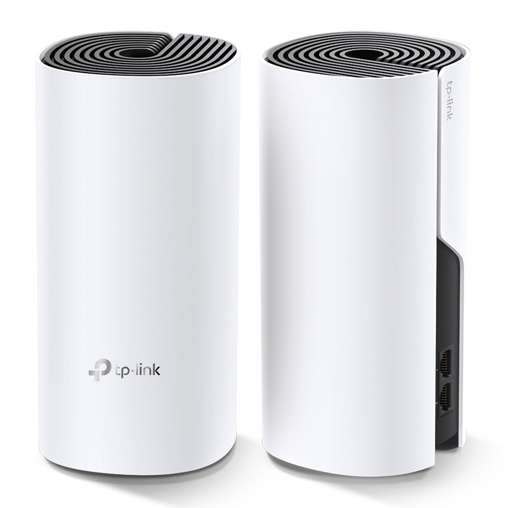 TP-Link Deco M4, two units — angled view showing one unit's port panel
