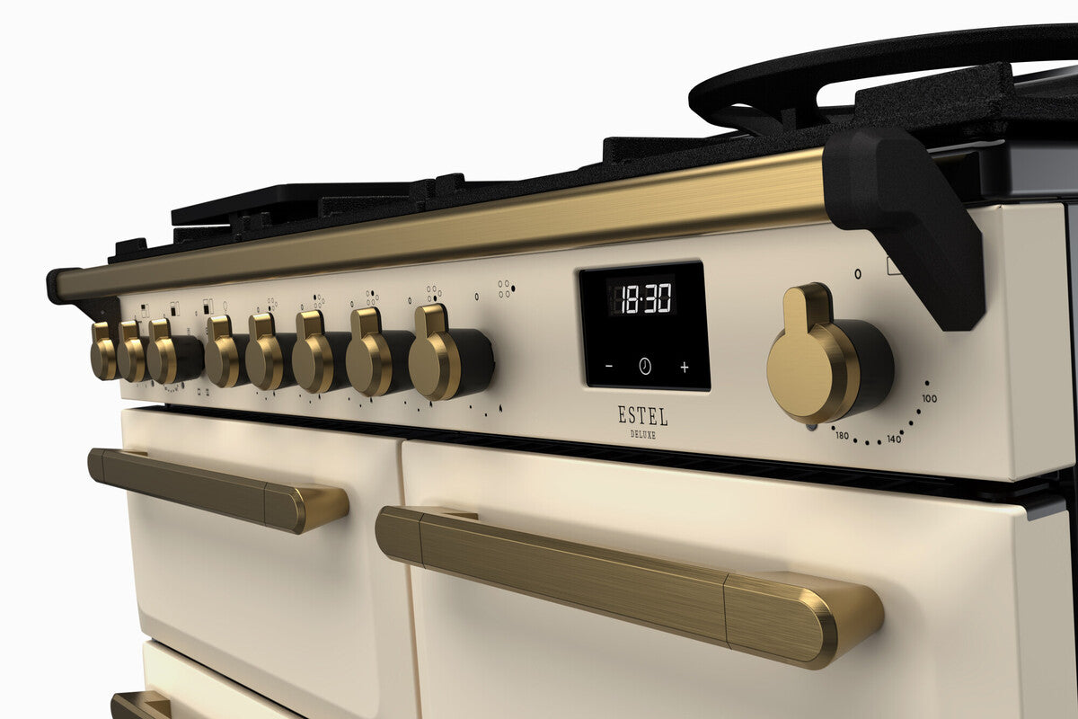 Rangemaster Estel Deluxe 100 Dual Fuel range cooker in Pale Cream with Antique Brass trim