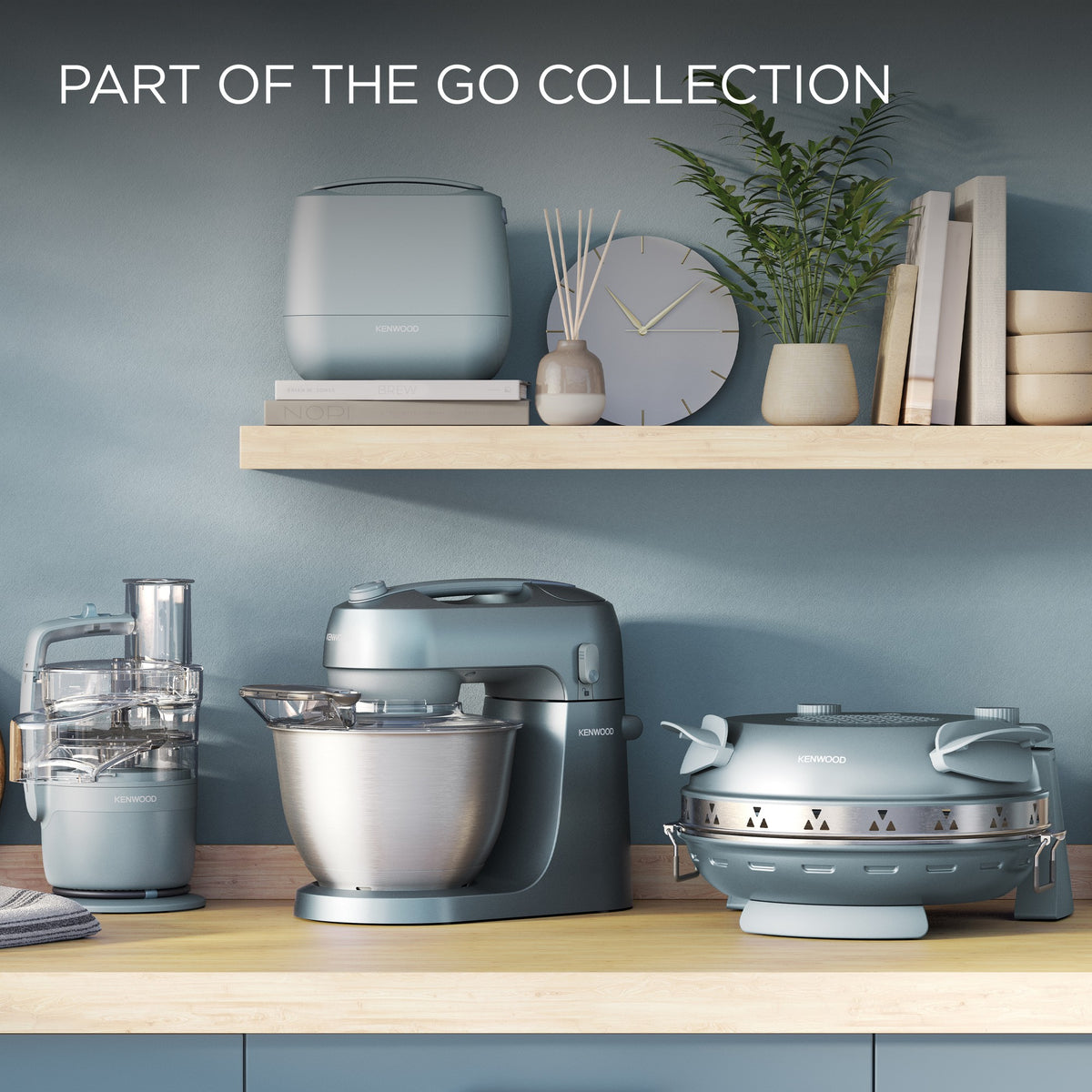 Kenwood My Pizzeria Pizza Oven - Storm Blue - on a shelf with the Kenwood Go collection