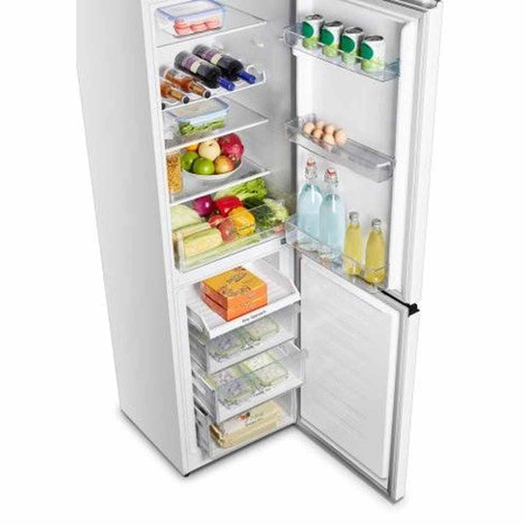 Hisense RB327N4BWE fridge freezer with the doors open, stocked with food, angled view