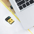 TP-Link UB500 Bluetooth 5.0 Nano USB Adapter — in-use, plugged into laptop