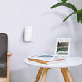 TP-Link RE200 AC750 Dual Band Wi-Fi Universal Wall-Plug Range Extender — minimal wall-mounted lifestyle view