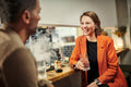 Sennheiser Conversation Clear Plus True Wireless Earphones — lifestyle, worn at a bar