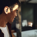 Sennheiser IE 600 Audiophile Earphones — lifestyle, worn portrait, close-up