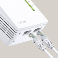 TP-Link TL-WPA4220 TKIT AV600 Powerline Wi-Fi Booster 2 LAN, 3 units — single-unit detail view showing two LAN ports
