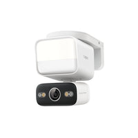 Tapo C710 outdoor pan and tilt security floodlight camera, three-quarter view, floodlight illuminated