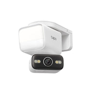 Tapo C710 outdoor pan and tilt security floodlight camera, front angled view, floodlight illuminated