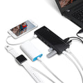 TP-Link UH720 USB 3.0 7-Port Hub 2 Charging Ports — in-use, charging phone and smartwatch