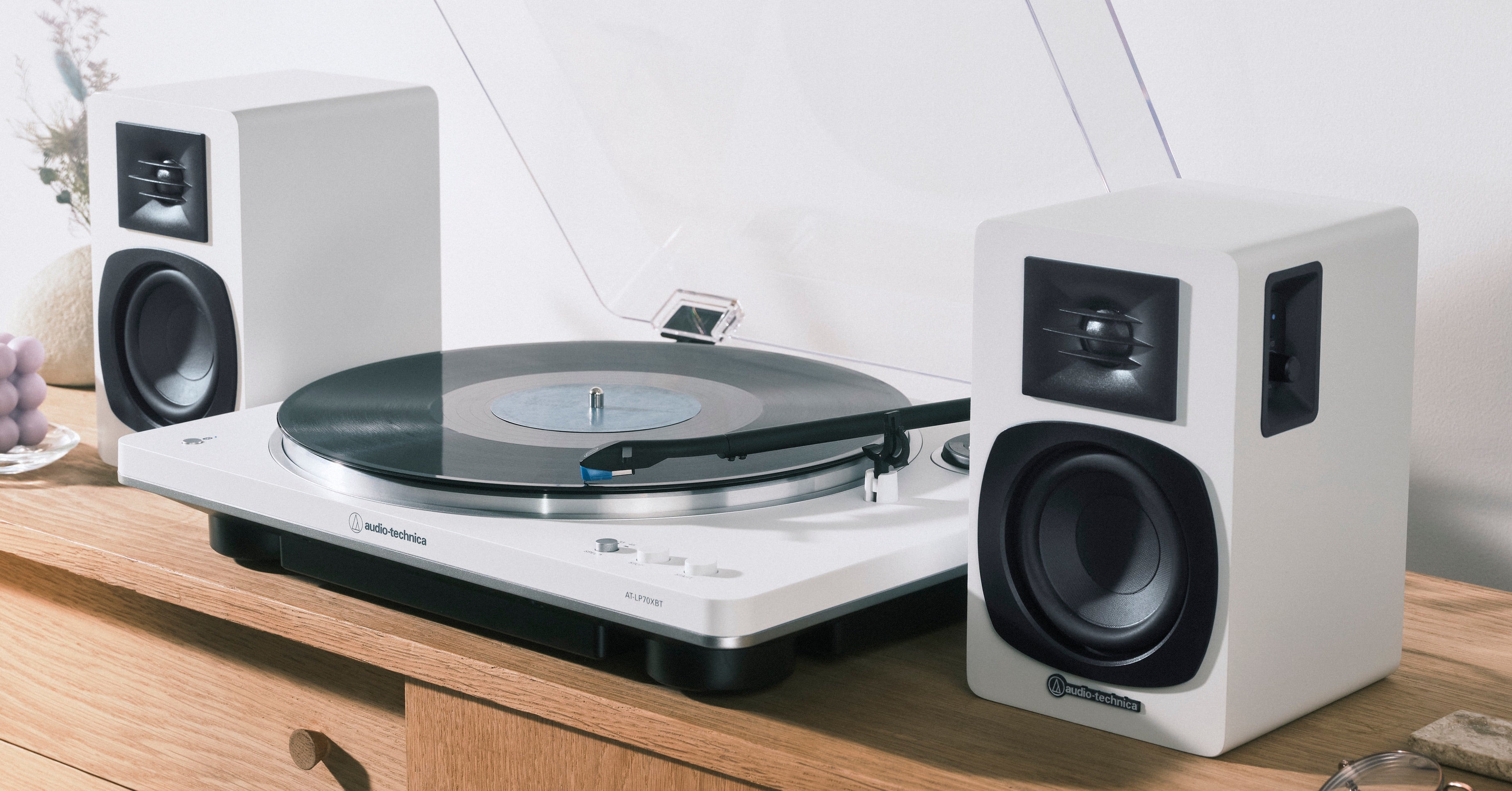 Audio-Technica AT-SP3XWH white powered speakers lifestyle view
