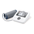 Beurer BM 27 upper arm blood pressure monitor, White — angled side view with cuff