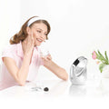 Beurer BS 49 Illuminated Cosmetics Mirror in use, woman applying cream in front of mirror