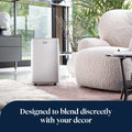 De'Longhi Tasciugo AriaDry Evo 14L Dehumidifier - White - in a living room