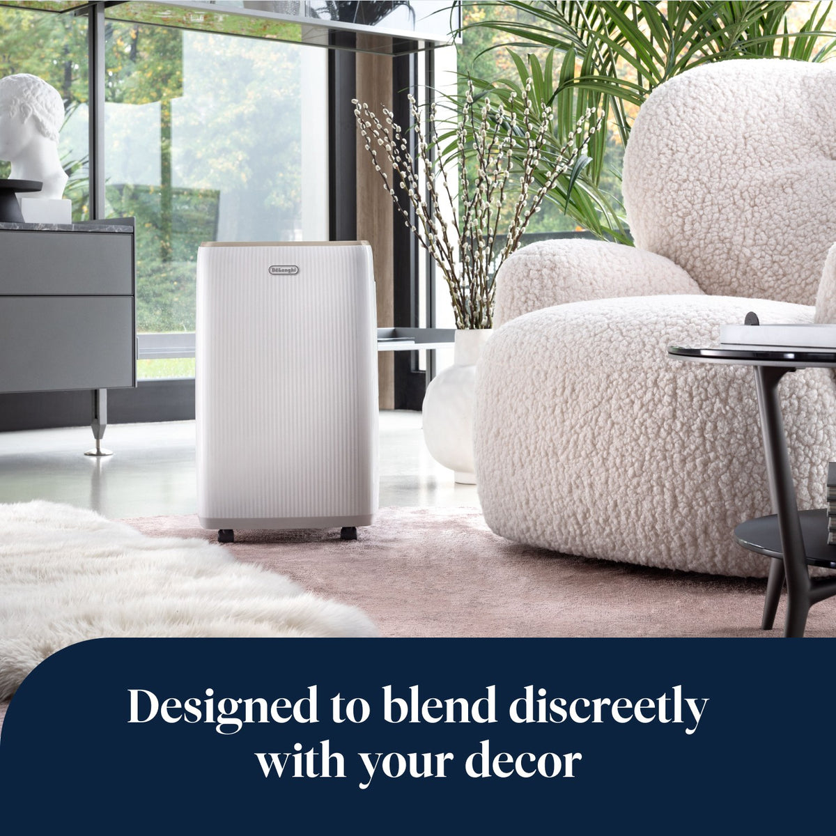 De'Longhi Tasciugo AriaDry Evo 14L Dehumidifier - White - in a living room