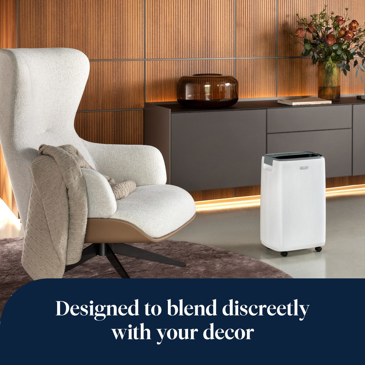 De'Longhi Tasciugo AriaDry Evo 16L Dehumidifier - White - in a living room