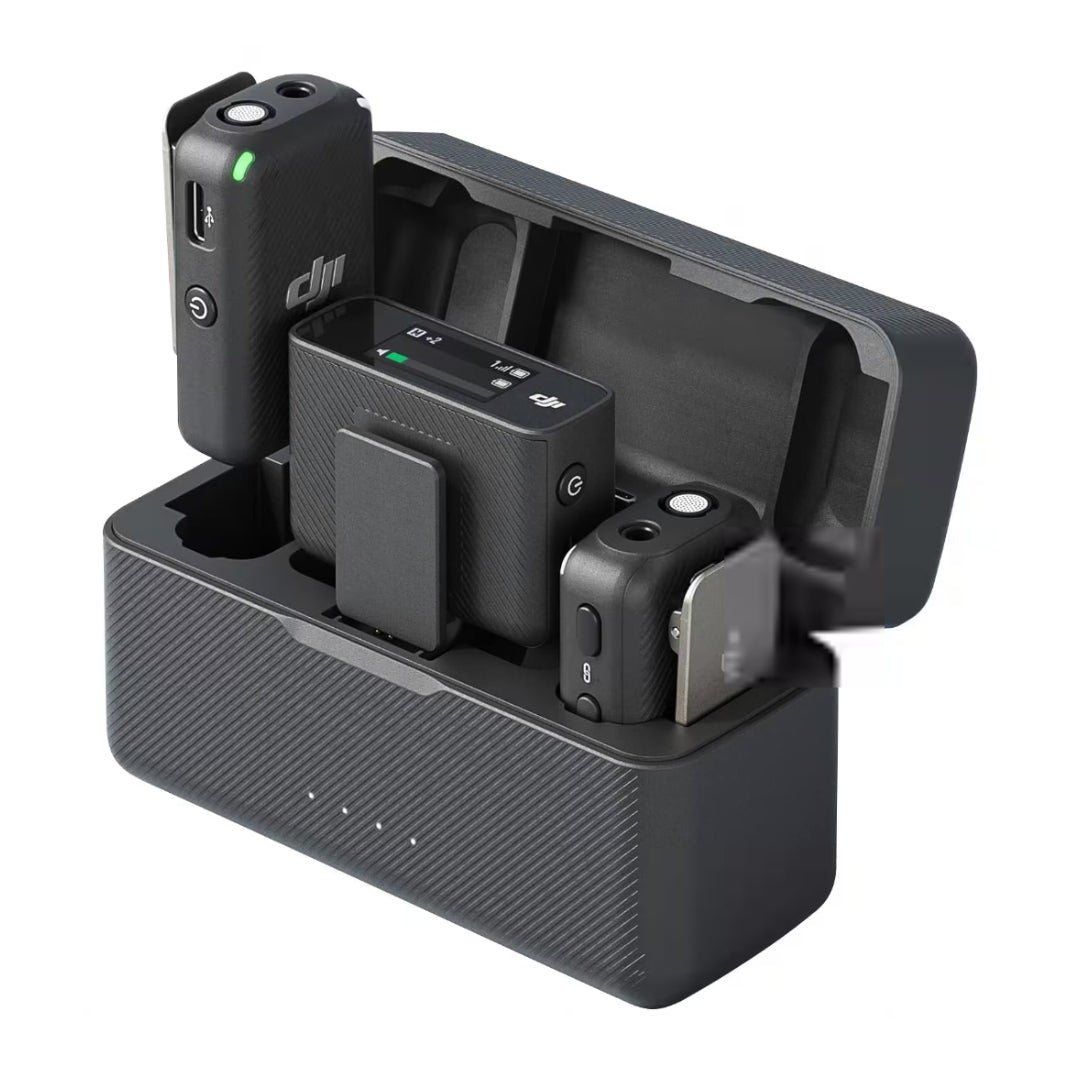 DJI Mic 2 CP.RN.00000324.02 charging case open with two transmitters and receiver inside