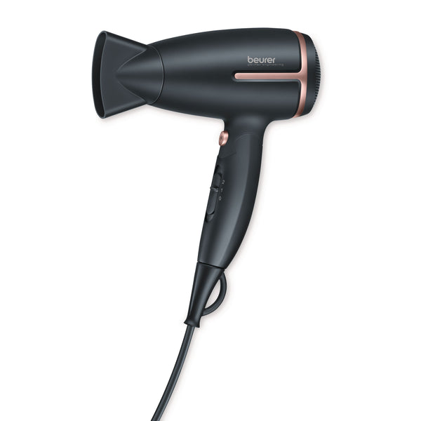 Beurer HC 25 Travel Hair Dryer with Ion, studio shot showing black and rose-gold folding dryer
