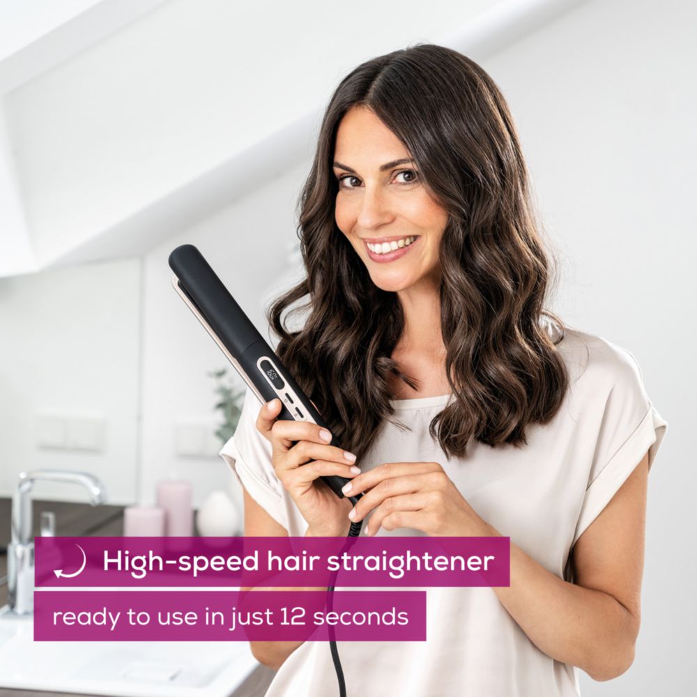 Beurer HS 100 Hair Straightener with Ion, in use, high-speed hair straightener ready in 12 seconds