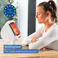 Beurer IL 60 Infrared Lamp side view, woman using lamp at table, Made in Europe