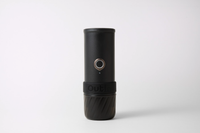 Outin Mino portable electric espresso machine in Space Grey with capsule adapter, filter basket and coffee cup