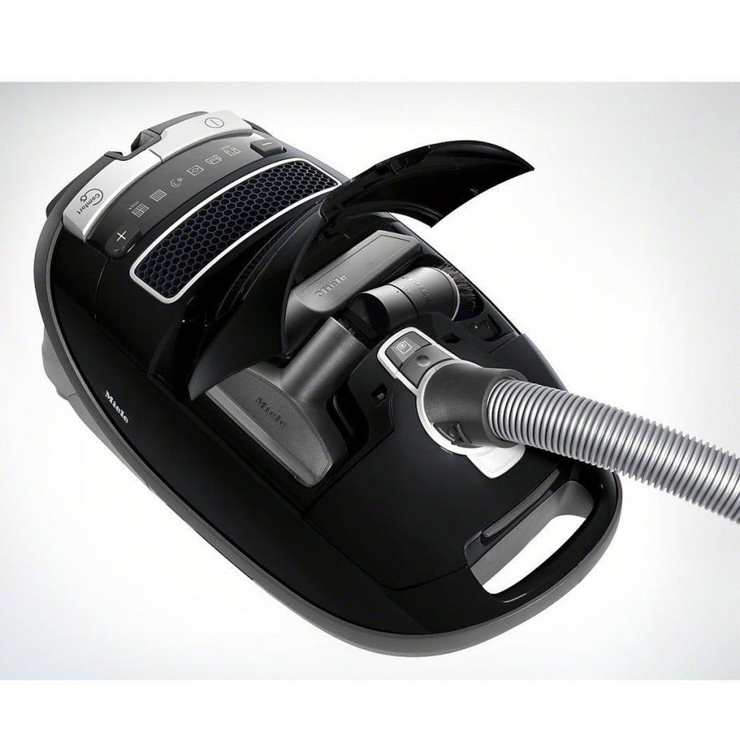 Miele Complete C3 Select Parquet 11819080 vacuum cleaner viewed from above with hose and tools