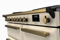 Rangemaster Estel Deluxe 100 Induction range cooker in Pale Cream with Brass trim