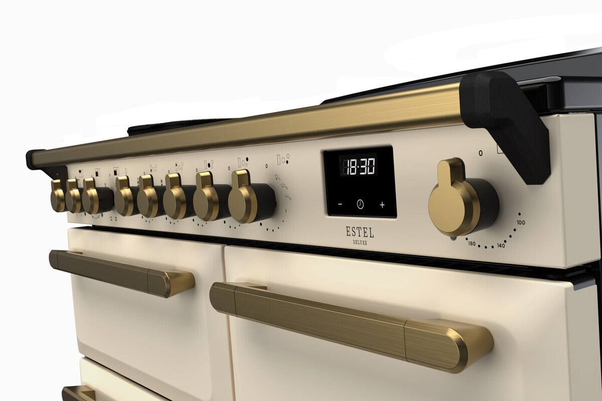 Rangemaster Estel Deluxe 100 Induction range cooker in Pale Cream with Brass trim