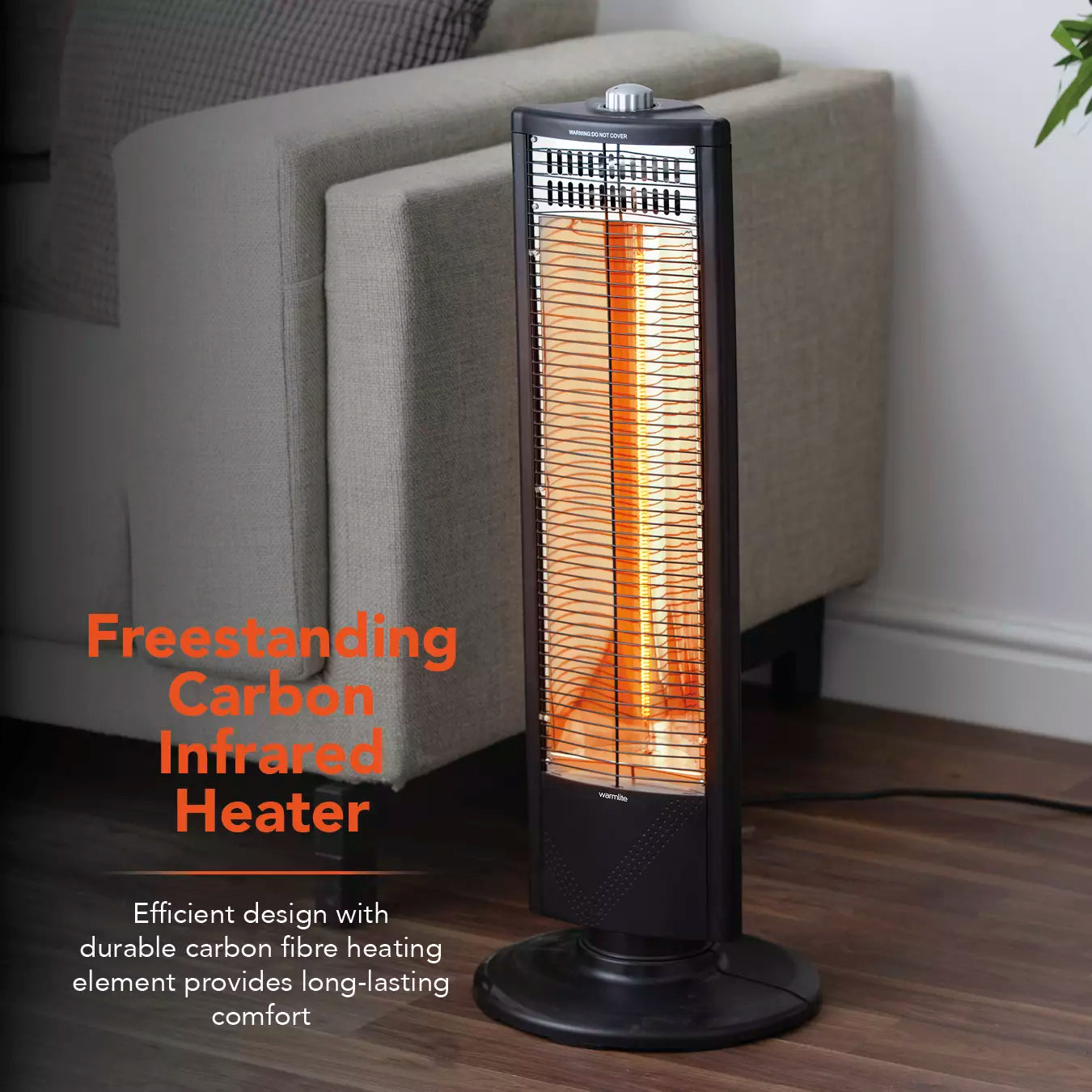Warmlite WL42013 carbon infrared heater in a living room setting beside a sofa