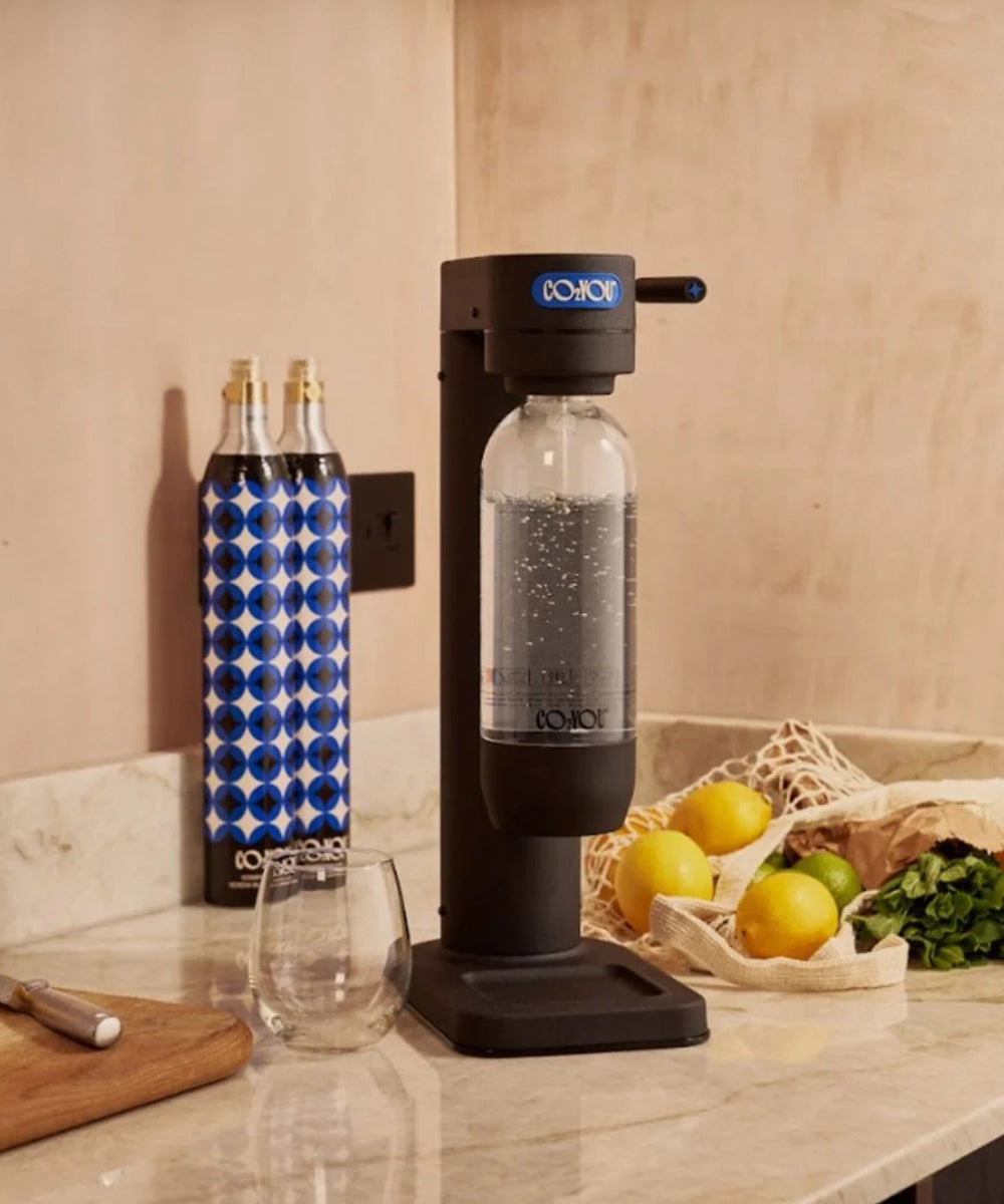 CO2U Screw-In CO2 Cylinder - beside a sparkling water machine
