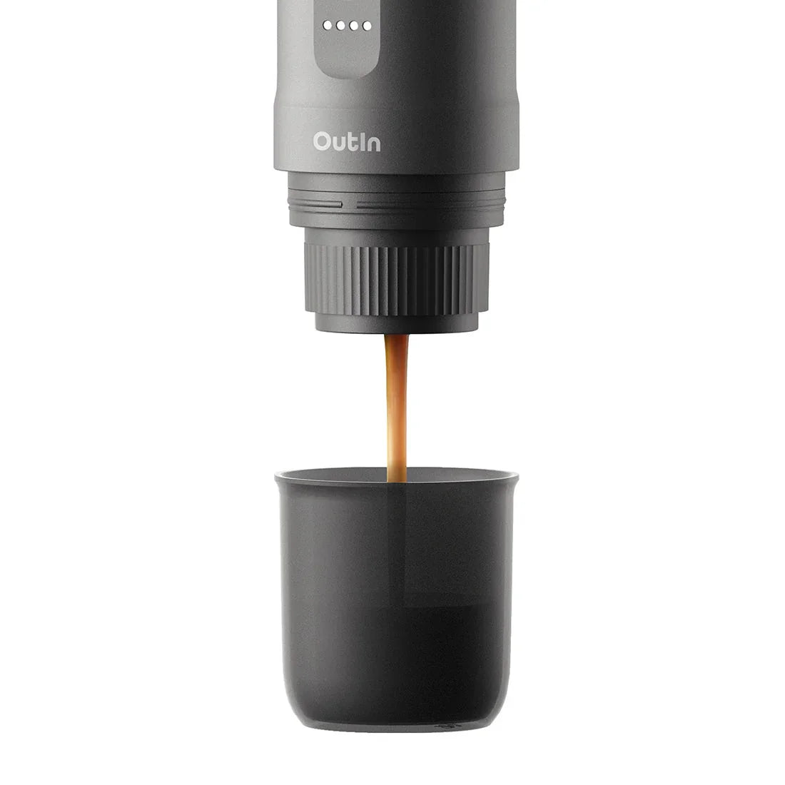 Outin Nano portable espresso machine in Space Grey with ground coffee, coffee capsules and a glass of espresso