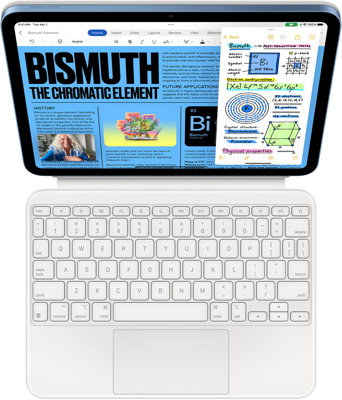 Apple iPad 11" (A16) 128GB Wi-Fi Tablet - Blue - top-down view on Magic Keyboard Folio, Pages on screen