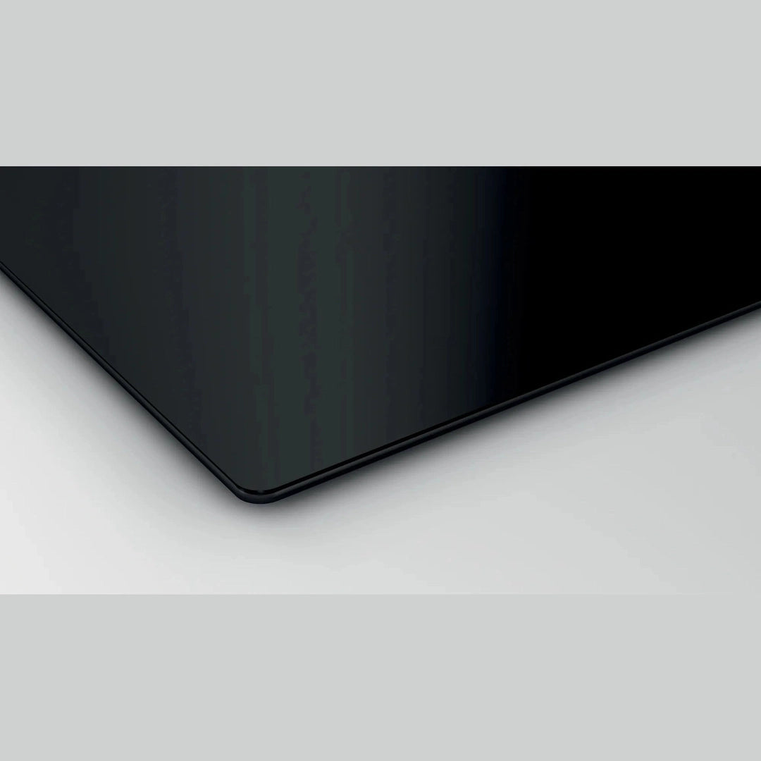 Siemens iQ300 EH611BE15E induction hob, close-up of the glass corner