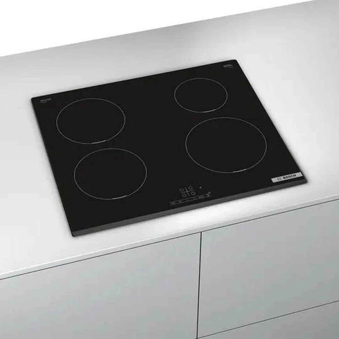 Bosch Series 4 PIE631BB5E induction hob, angled view on a worktop